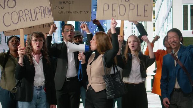 People protesting together during a strike and public march against corruption, holding posters and banners with warning messages about justice in a serious anti-corruption movement. Camera A.