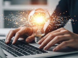 Close-up of hands typing holding glowing light bulb representing artificial intelligence automation and machine learning strategy