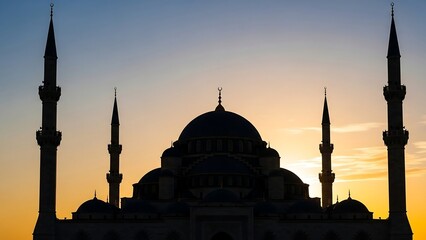Silhouette of Mosque at Sunset with Minarets.