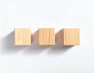 Three wooden blocks aligned horizontally on a white background with shadows.