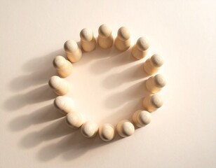 Wooden Peg People Arranged in a Circle Formation.