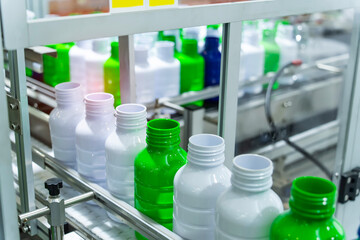 automatic conveyor line for the production of plastic bottles close-up