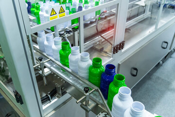 automatic conveyor line for the production of plastic bottles close-up