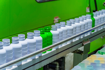 automatic conveyor line for the production of plastic bottles close-up