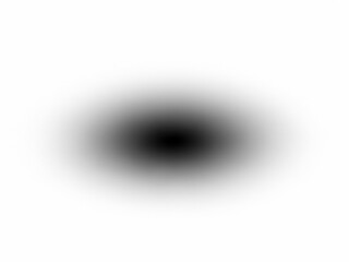 A blurry black oval shape on a white background