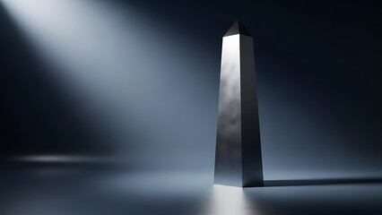 A sleek, metallic monolith bathed in dramatic spotlight, symbolizing mystery and futuristic design