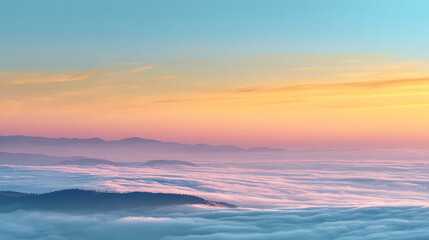 Obraz premium A breathtaking view of soft clouds and mountains at sunrise, displaying pastel colors in the sky.