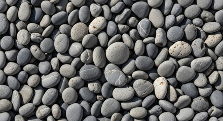 Close-up texture assorted smooth gray white beach pebbles river stones tightly packed together, for nature's endurance, foundation, geological tranquility