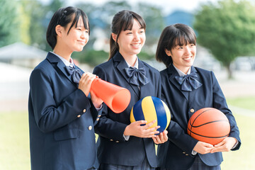 Basketball, high school girl holding volleyball, junior high school student, high school student, elementary school student