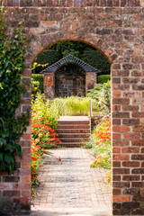 old brick wall with archway