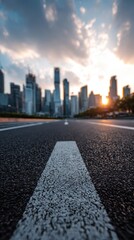 Vibrant photo of Empty Asphalt Road in City Center Leading Toward Skyscrapers at Sunset