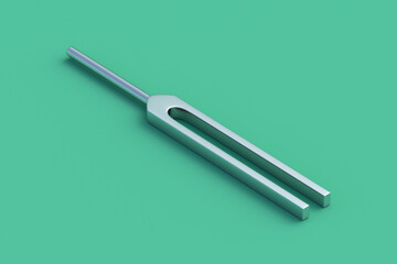 Tuning fork on green background. 3d render