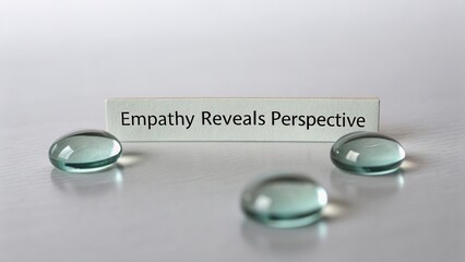 Empathy Reveals Perspective on a Minimalistic Background with Glass Stones Illustrating the Concept of Understanding