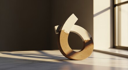 Three dimensional numeral six object rests on sunlit interior surface