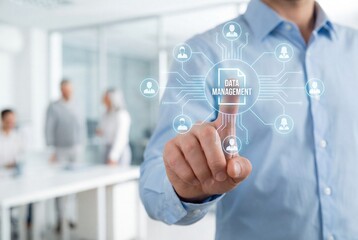 Businessman touching data management icon on virtual screen with connection network in modern office