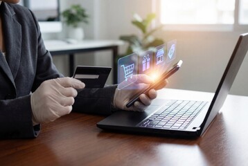 Fototapeta premium Professional in latex gloves using smartphone and credit card for contactless online shopping payment