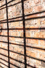 Obraz premium brick wall background with a patterned shadow