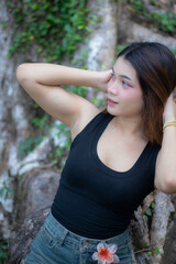 Beautiful Asian woman model in a casual style with a vacation background