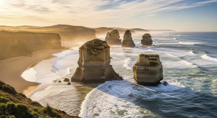 Dramatic ocean stacks rise from the water along a rugged coastline during golden hour lighting