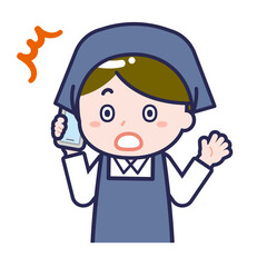 スマートフォンを使う「スタッフ」の男性