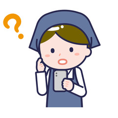 スマートフォンを使う「スタッフ」の男性