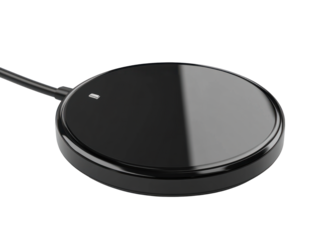 Black round wireless charging pad isolated
