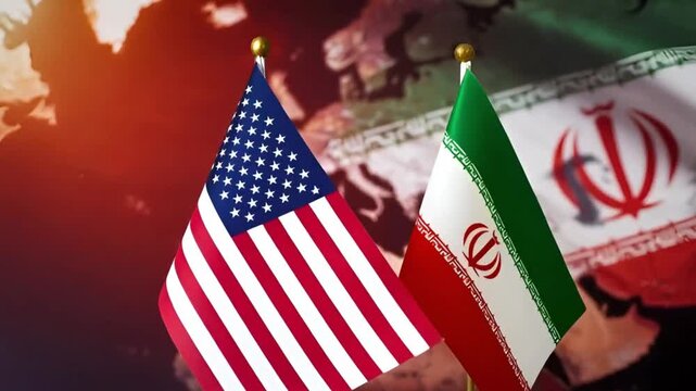 small table flags of the us and iran stand side by side against a background of a blurred world map and another state flag symbolizing international negotiations and diplomatic meetings