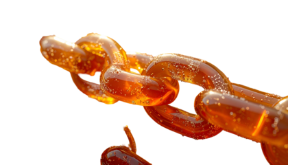 Close-up of a shimmering amber chain against a black background