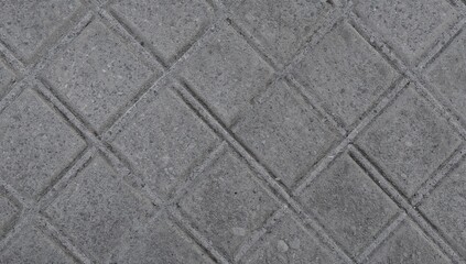 Fototapeta premium Concrete Paved Surface with Geometric Pattern in Gray Outdoor Setting