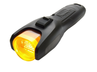 Black flashlight with glowing yellow front