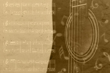 Modern black guitar on grey background, closeup