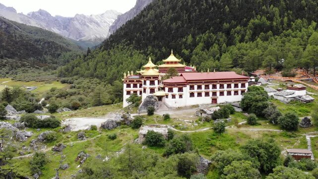 Breathtaking 4K UHD aerial and time-lapse footage of Daocheng Yading in Sichuan Province, a renowned natural reserve and tourist attraction famous for its Three Holy Mountains.