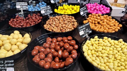 Colorful candy display on market stall with vibrant and varied options