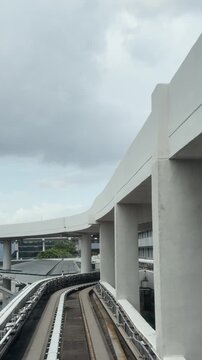 Automated People Mover Traveling on Elevated Track at Changi Airport Singapore