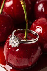Diamond Engagement Ring on Cherry, Luxury Romance Concept