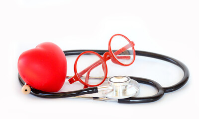 Red heart with stethoscope on white background, medical love and care concept.