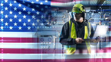 American industrial technician oversees machinery performance with a laptop, ensuring safe...