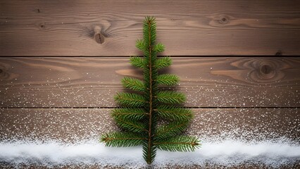 Christmas Tree Shape on Wooden Background with Snow and Glitter.