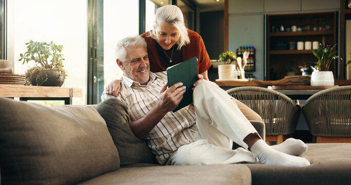Online, tablet and senior couple on sofa for subscription, connection and website in home. Retirement, happy marriage and old man and woman on digital tech for bonding, streaming and relax together