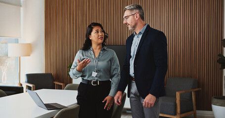 Laptop, meeting and business people in office with advice, review or feedback on legal project. Collaboration, tech and team of attorneys with planning, discussion and together for law case research