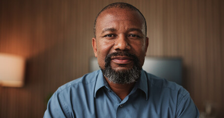 Fototapeta premium Serious, business and black man with portrait in office for career pride, about us and accounting. Confident, mature person and ambition with skills, finance bookkeeping and consultant for investment
