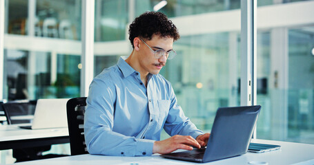 Fototapeta premium Office, laptop and man with glasses, research and risk assessment for investment proposal or online. Business, financial analyst and person with tech for asset management, info and budget review