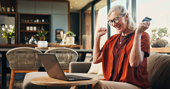 Laptop, online shopping and woman with credit card, excited and happy with discount offer on website. Digital, purchase and mature person with tech for payment, winner or celebration for sale in home
