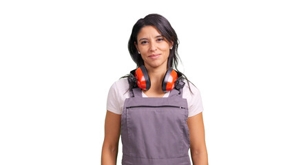 Female construction worker with ear muffs and apron