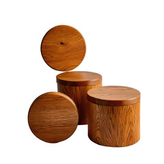 Four stacked wooden cylindrical tables on black
