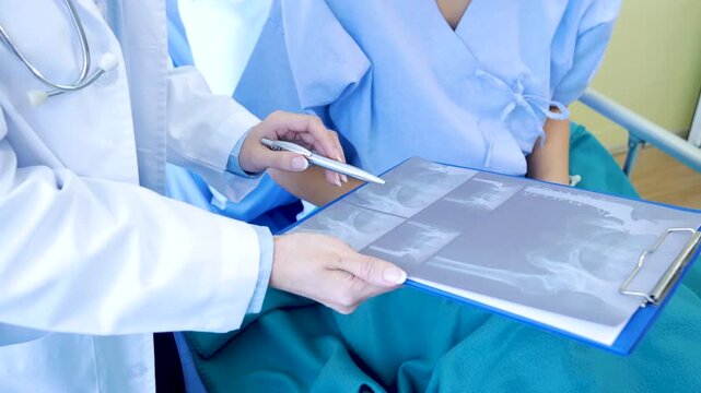 Asian women doctors using stethoscope listen respiratory rate from lungs diagnostics analyse patient in hospital medicare treatment clinic for medical healthcare chest cancer therapy using laptop.