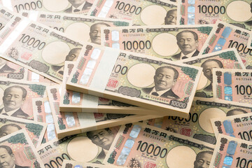 一万円札の束が並んだ背景