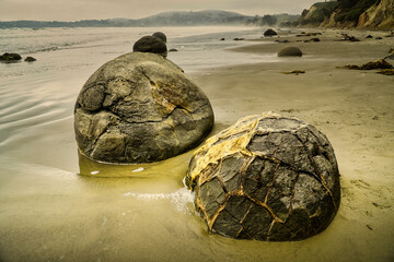 Large Weathered Moeraki Boulders New Zealand, sunset