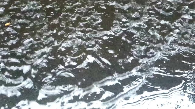 Heavy Rain on Water Surface