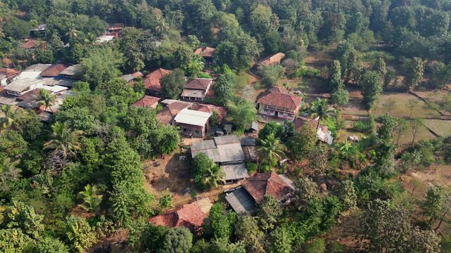 push back ariel village shot, village homes on hill